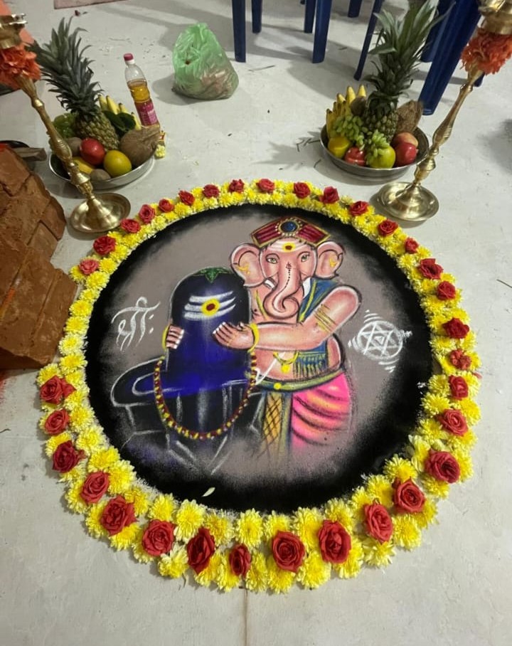 Hand-drawn traditional sacred Rangoli of Lord Ganesha