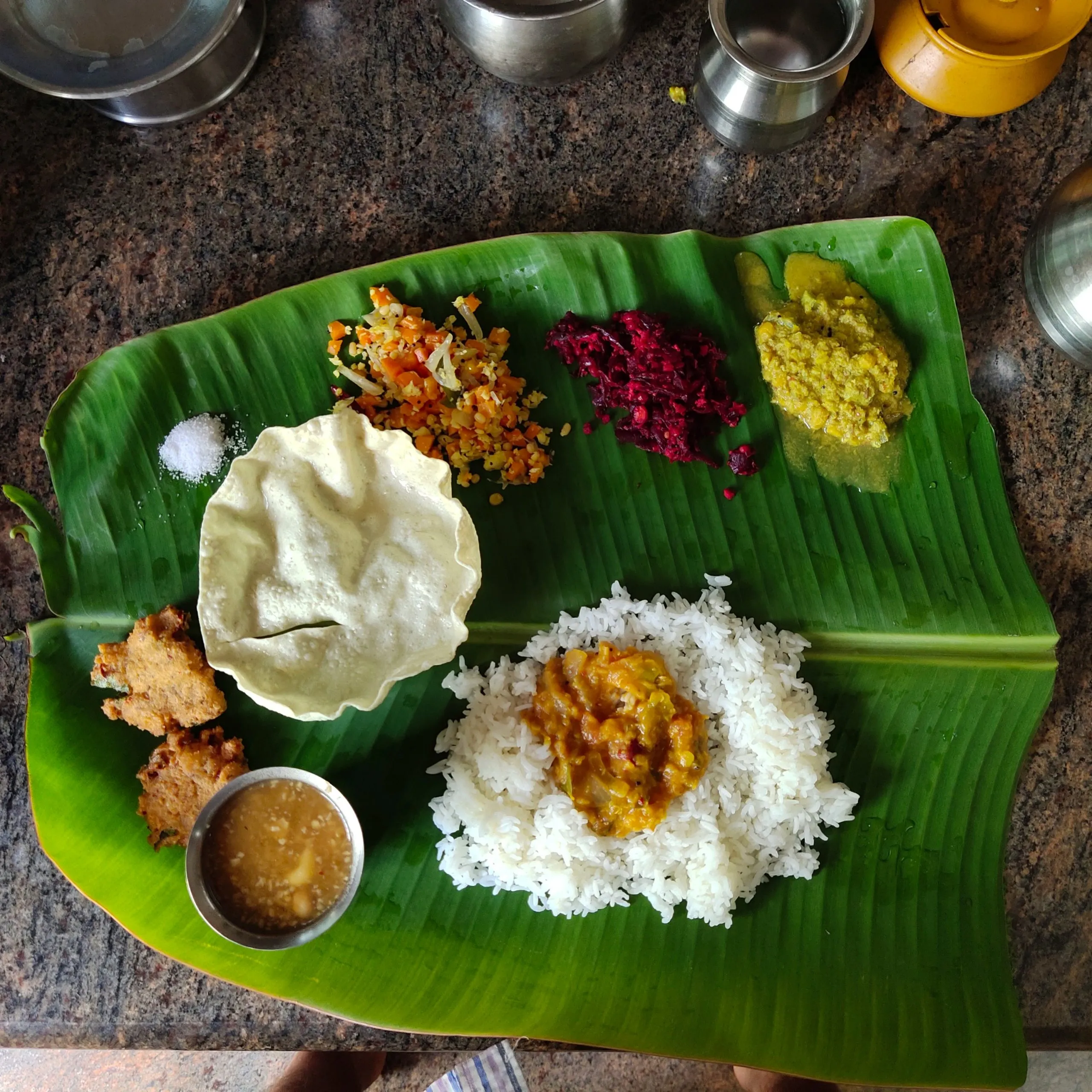 Grand traditional plantain banana leaf banquet spread with all accompaniments